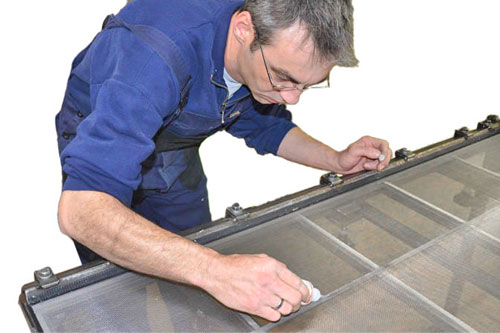 Service d'entoilage de tamis